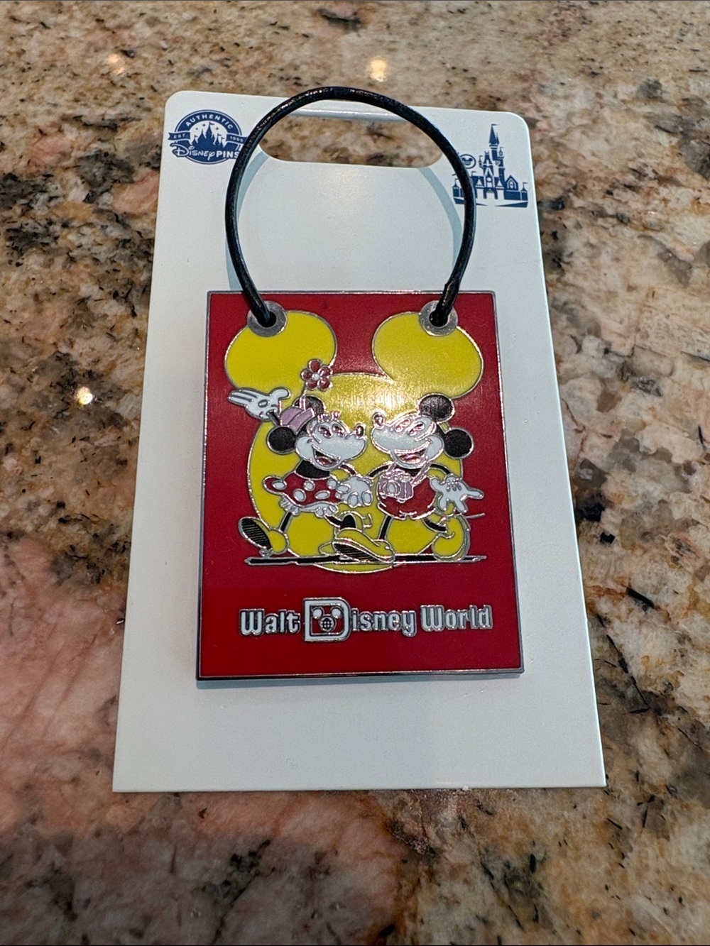 Walt Disney World Pin Backing Card with Yellow Label and Black Clutch